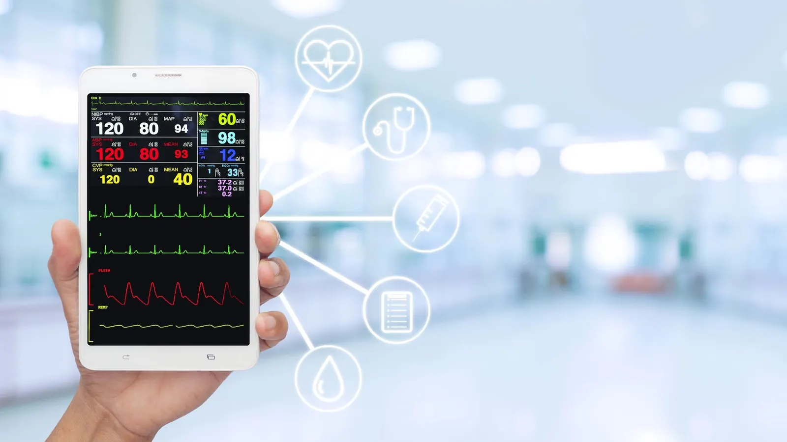 A person holding a phone that shows a care monitoring view.